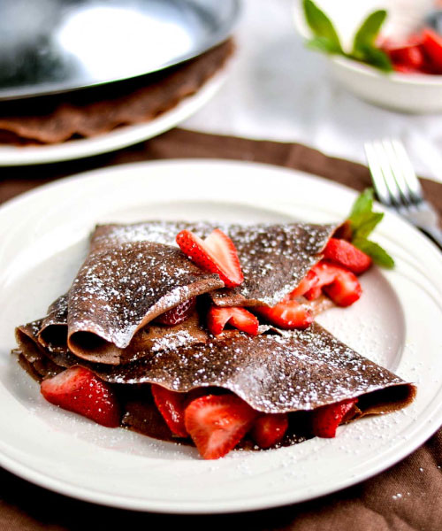 crepe carob powder and strawberry syrup